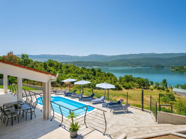 Ferienhaus für 8 Personen, mit Seeblick und Terrasse sowie Garten - 1