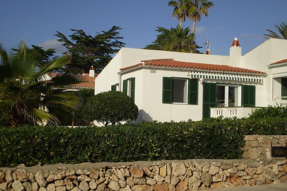 Holiday house with beautiful sea view and garden in Punta Prima, Sant Lluís