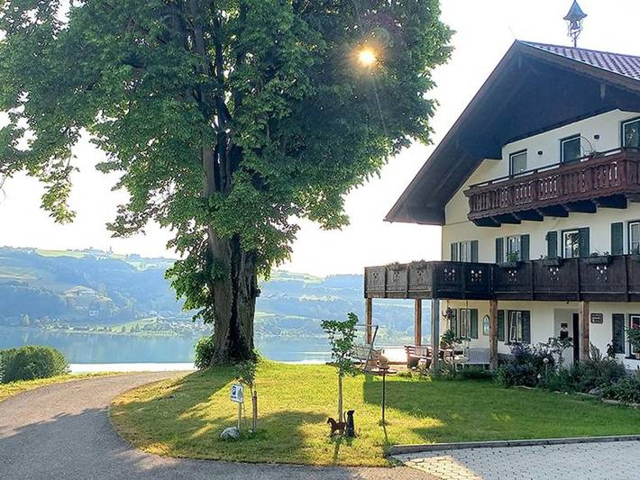 Ferienwohnung für 2 Personen, mit Terrasse und Garten sowie Seeblick in Irrsee