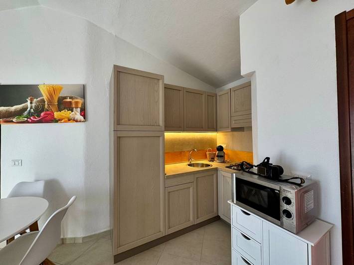 Apartamento vacacional entero, Apartamento de vacaciones para 4 personas con balcón in Isola Rossa, Trinità d'Agultu e Vignola