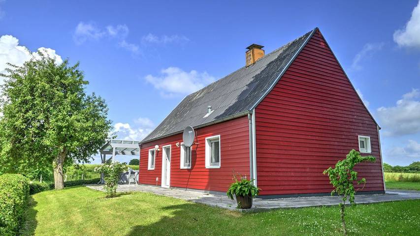 Ferienhaus für 4 Personen, mit Terrasse und Balkon/Terrasse sowie Ausblick in Husby