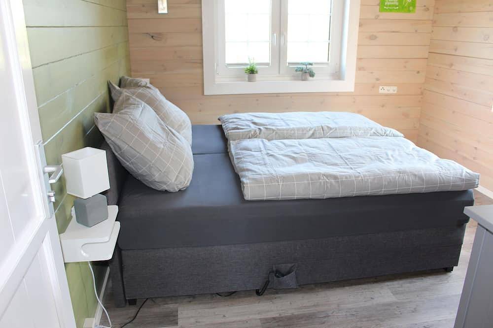 Idyllisches Blockbohlenhaus mit eigenem Garten und Sauna zum Wohlfühlen in Martensrade, Südliche Ostseeküste