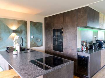 Ferienwohnung für 6 Personen, mit Terrasse und Sauna sowie Garten und Seeblick in Strobl