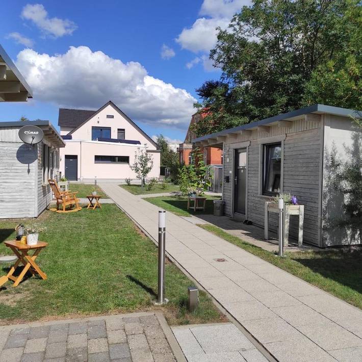Ferienwohnung für 3 Personen, mit Terrasse und Garten sowie Sauna und Ausblick