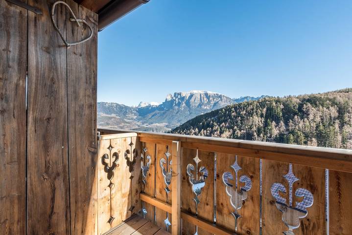 Appartamento intero, Appartamento "Aschnerhof Holzhitt" con vista sulle montagne, balcone privato e Wi-Fi in Longomoso - Lengmoos, Renon