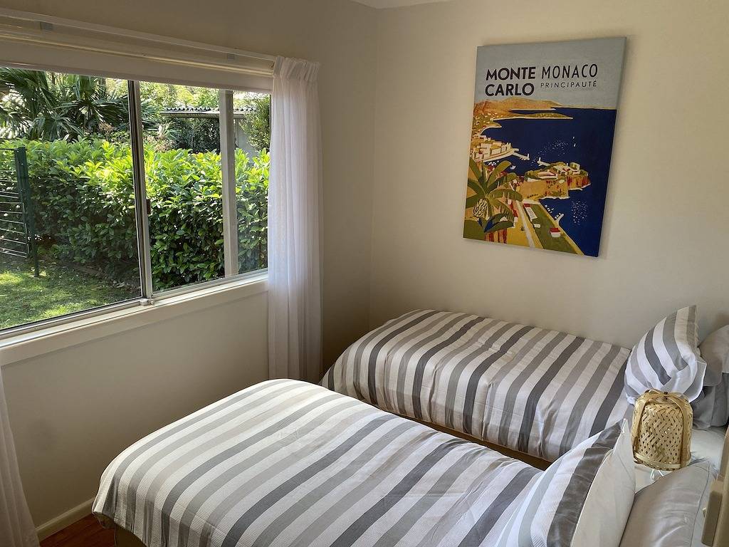 Pearl Bliss, a sundrenched, secluded oasis 200m from spectacular Pearl Beach in Pearl Beach, New South Wales