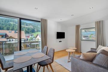 Ferienwohnung für 4 Personen, mit Balkon und Garten am Pragser Wildsee