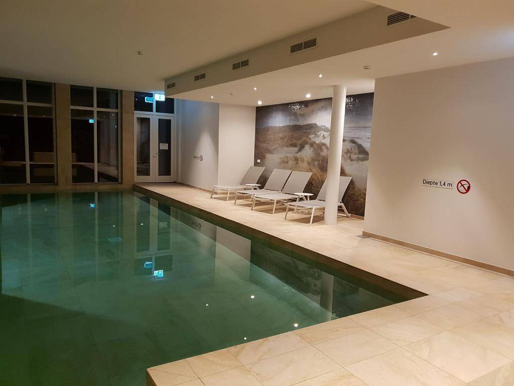 Familie beachhuis op de duinen (Duinhuis) in Cadzand-Bad, Zeeuwse Kust