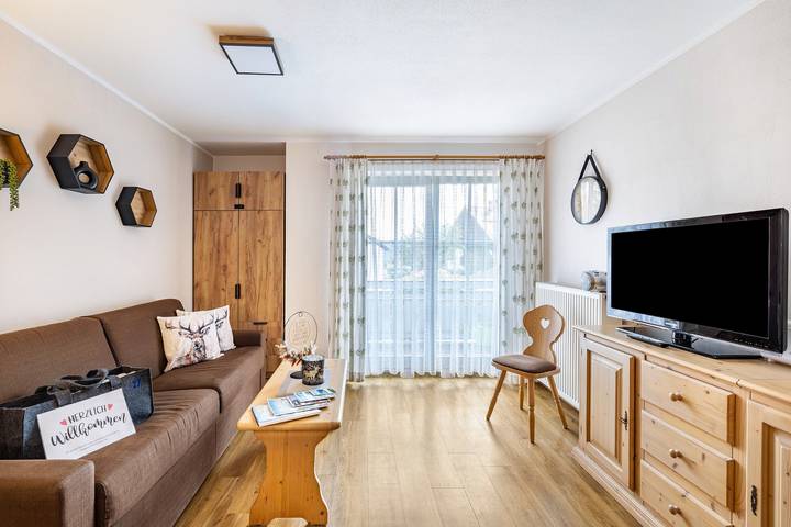 Appartement entier, Appartement « Brünnstein n°27 » avec vue sur la montagne, piscine commune et sauna in Oberaudorf, Alpes bavaroises