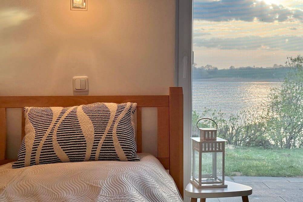Gemütliches 5* Ferienhaus direkt am Wasser | Wlan | Sauna | Kamin | Whirlwanne in Kosel, Ostsee Schleswig-Holstein