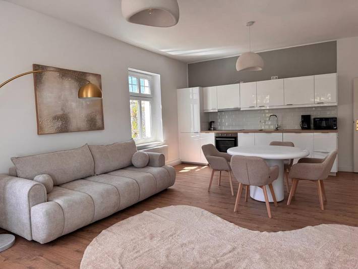 Ferienwohnung für 4 Personen, mit Balkon und Garten sowie Seeblick und Ausblick