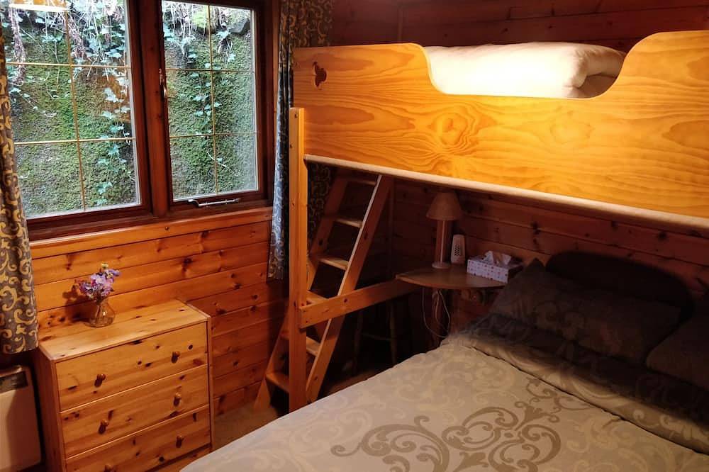 Luxury pine log cabin positioned within the mountains of the Lake District in Skelwith Bridge, Lake District
