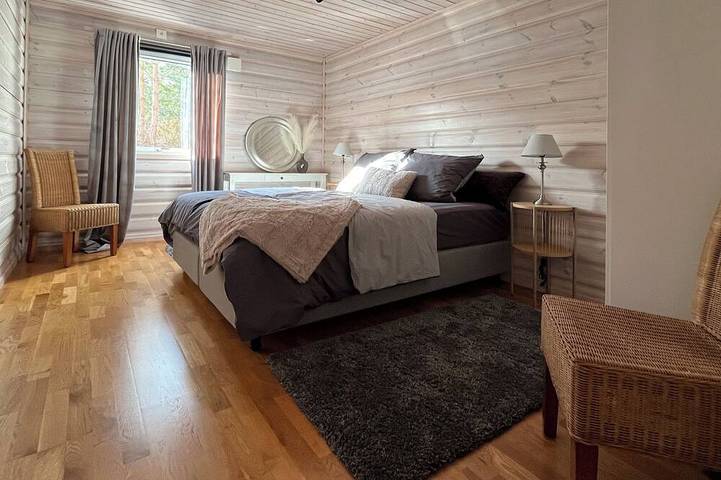 Beautiful 150-square-meter villa with an open gallery, a fireplace, and a boat on the lake in Nybro region