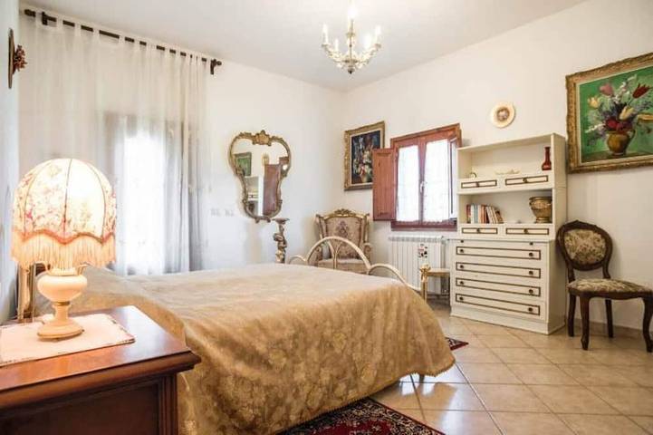 Detached cottage in a landscaped garden with a view of the pool in Fauglia, Riviera Toscana