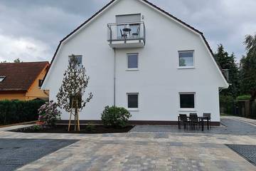 Ferienwohnung für 4 Personen, mit Balkon und Garten in Hoppegarten