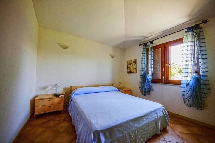 Villetta singola bifamiliare vicino a Budoni con giardino e veranda in Porto Ainu, Budoni