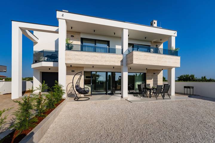 Ferienwohnung für 5 Personen, mit Garten in Vrsi