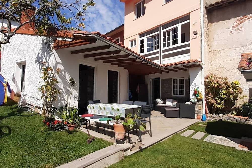 Appartement entier, 14A07 Casa de playa Elisa con Jardín in La Isla (Colunga), Colunga