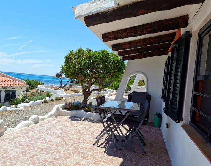 Location de vacances pour 4 personnes, avec Terrasse ainsi que Jardin et Vue dans Platja de l'Almadrava