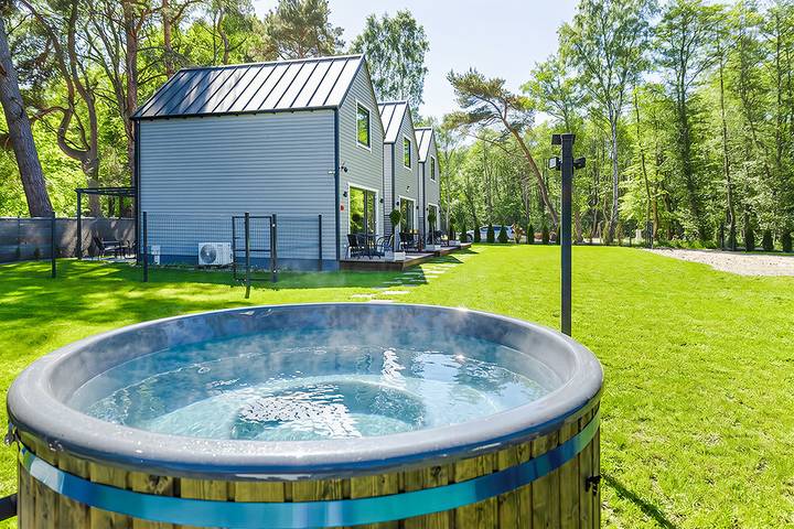 Ferienhaus für 6 Personen, mit Whirlpool und Terrasse sowie Garten in Mrzeżyno