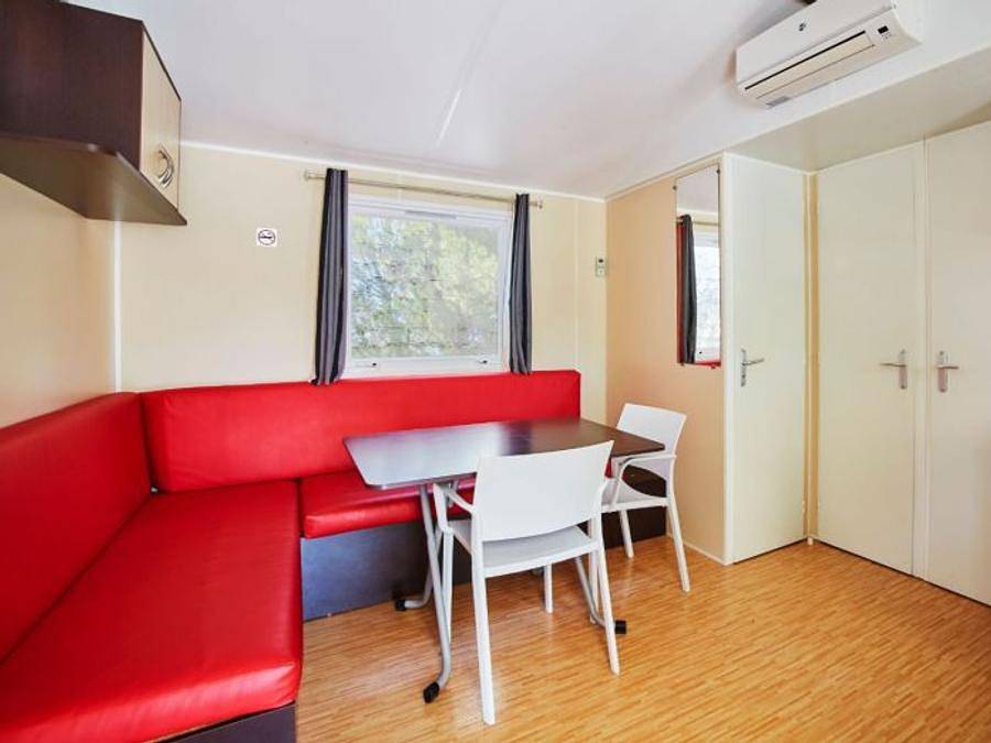 Camping Alannia Costa Dorada - Mobilheim 4 personen - Olea Cottage A1 in Platja de l'Almadrava, Vandellòs i l'Hospitalet de l'Infant
