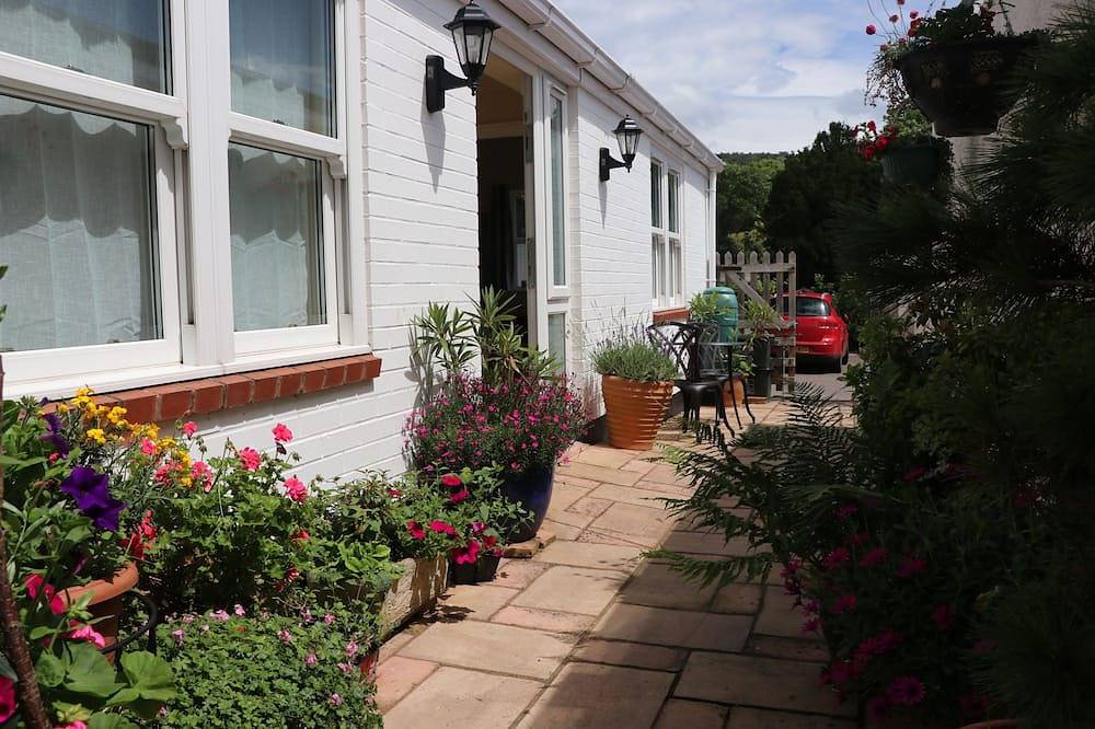 Geheel appartement, Appartement op de begane grond, dicht bij het strand en het stadscentrum, met parkeergelegenheid in Sidmouth, Devon