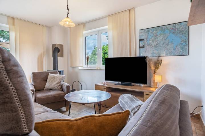 Appartement entier, Appartement 'Haus 11 Eg' avec vue sur le lac, terrasse privée et Wi-Fi in Röbel, Lac Müritz