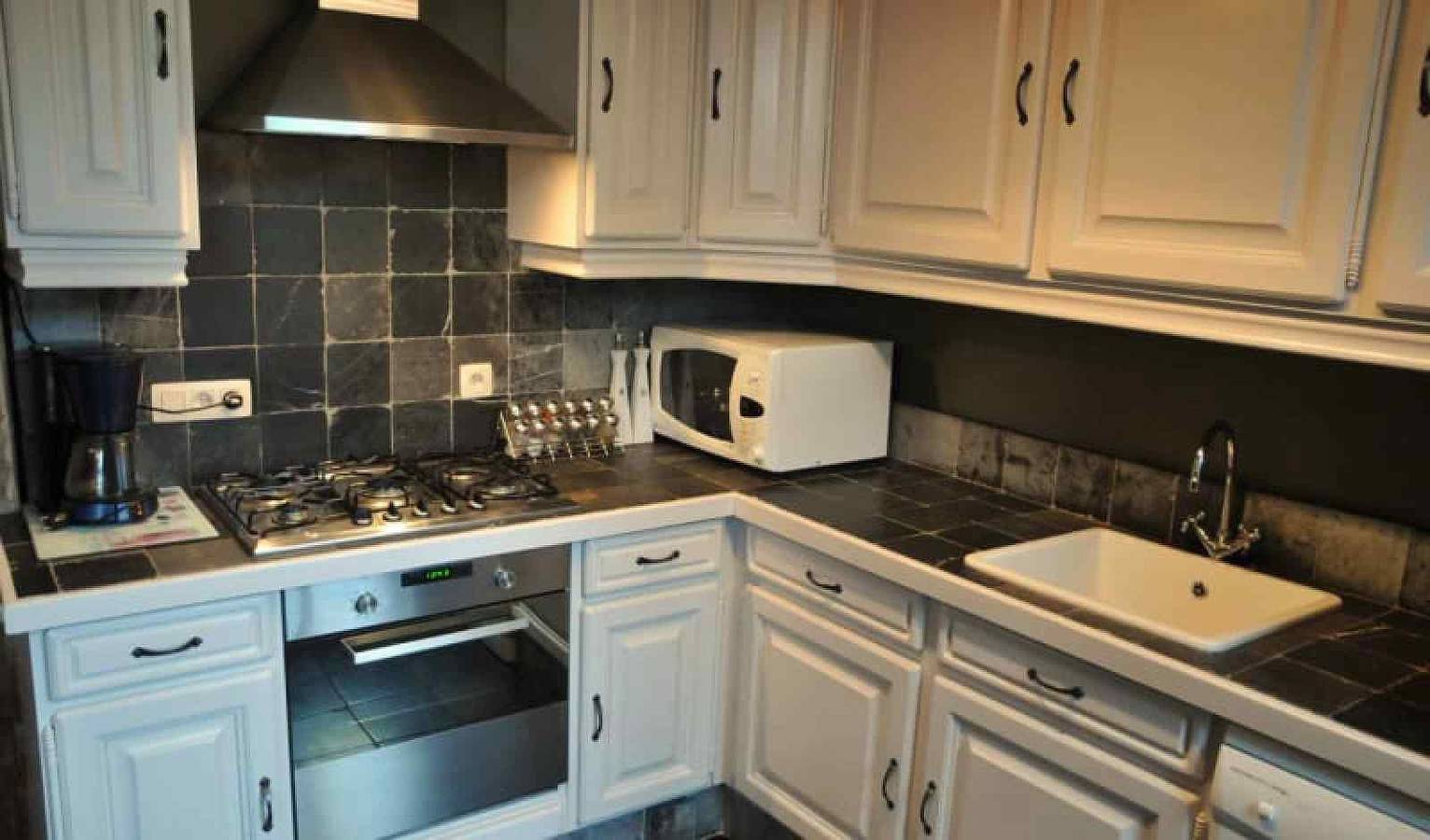 Renovated stone village house for 8 persons in the middle of a typical Ardennes village. in Hotton, Province de Luxembourg