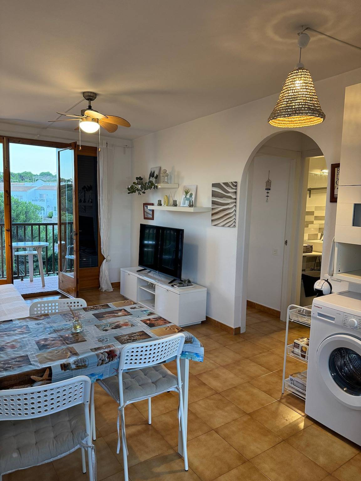 Entire apartment, Apartment 'Dreams Of Menorca' with Sea View, Shared Pool, and Wi-Fi in Arenal d'en Castell, Es Mercadal
