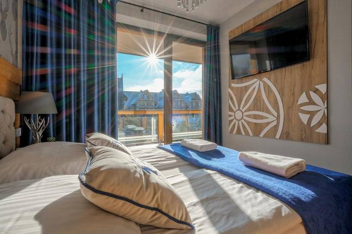 Ośrodek wypoczynkowy dla 2 osób, z Balkon i Jacuzzi oraz Ogród i Sauna w Białka Tatrzańska
