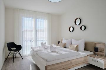 Ferienwohnung für 4 Personen, mit Garten und Seeblick sowie Ausblick und Sauna in Zirchow