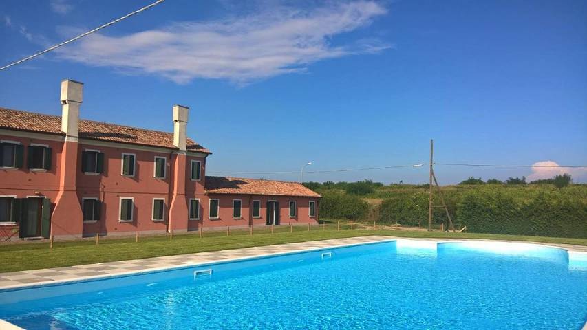 Appartamento per 2 persone, con Giardino e Piscina nonché Panorama a Porto Tolle