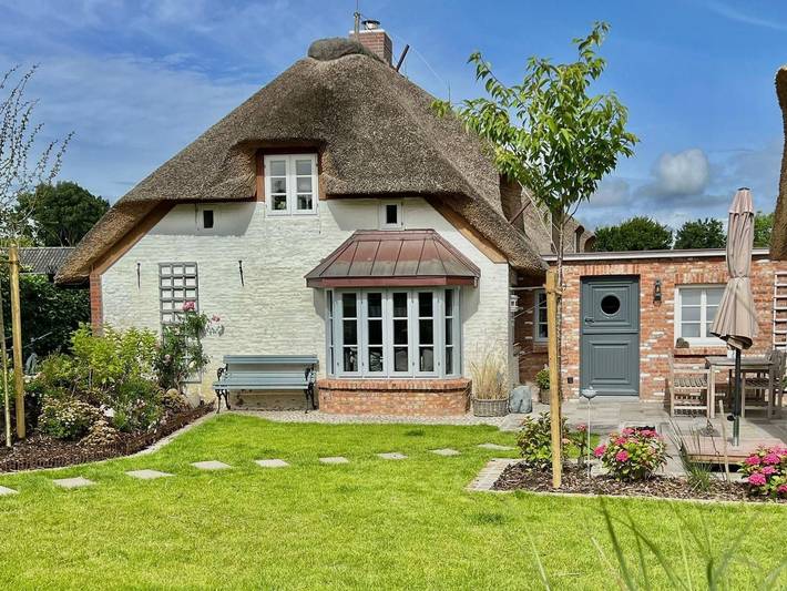 Ferienhaus für 3 Personen, mit Terrasse und Garten in Midlum