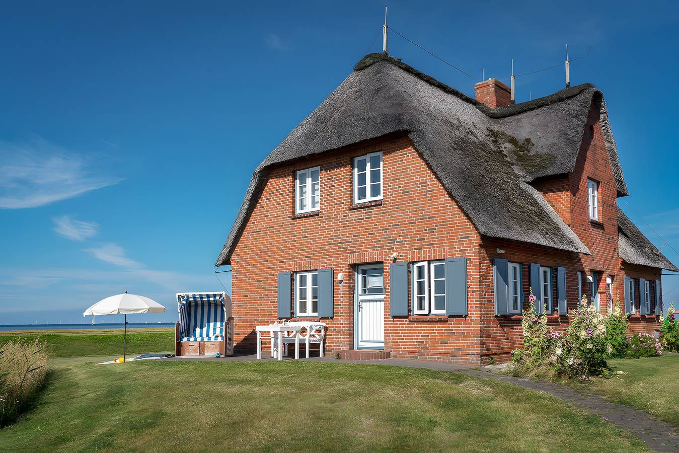 Ferienhaus „Haus Nordmarsch“ mit Meerblick, privater Terrasse und Wlan in Langeneß, Halligen