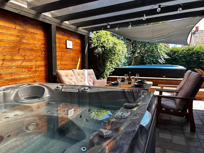 Appartement de vacances pour 4 personnes, avec terrasse et jardin ainsi que jacuzzi et piscine