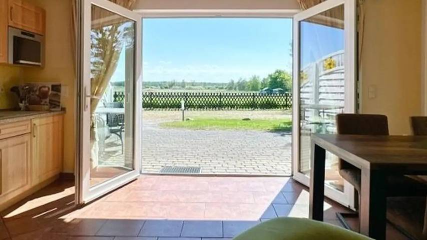 Ferienhaus für 4 Personen, mit Garten in Börgerende-Rethwisch