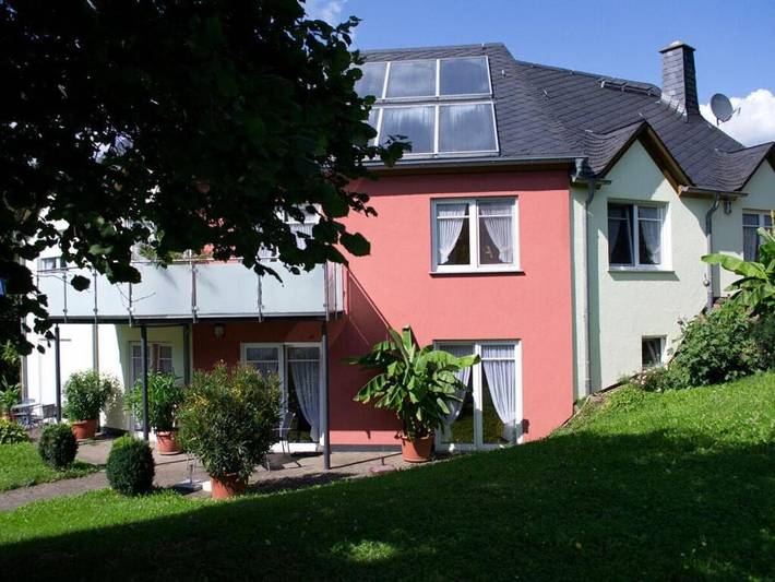 Ferienhaus für 4 Personen, mit Balkon und Garten sowie Sauna