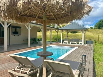 Location de vacances pour 6 personnes, avec jardin ainsi que balcon et piscine dans Pointe Faula