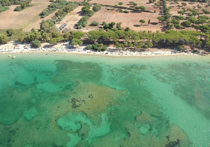 Casa vacanza per 3 persone, con Terrazza e Giardino nonché Vista lago e Panorama a Fertilia