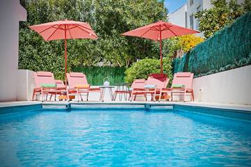 Location de vacances pour 12 personnes, avec jardin et piscine dans Playa d'en Bossa