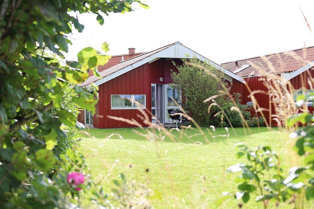Ferienhaus \"Sanderling\" - gemütliches Holzhaus mit Blick auf die Schafswiesen in Kating, Tönning