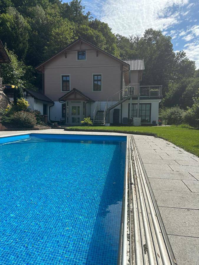Ferienwohnung für 2 Personen, mit Terrasse und Garten sowie Pool und Ausblick in Stolberg (Südharz)