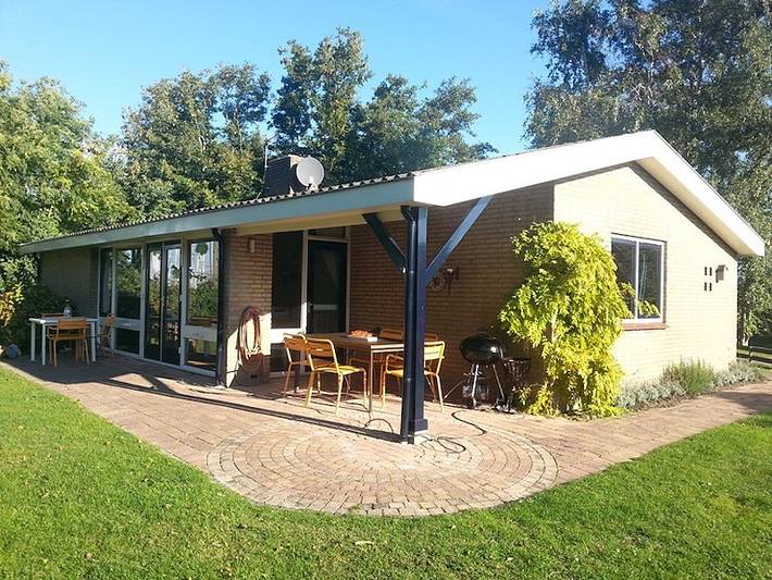 Ferienhaus für 8 Personen, mit Balkon/Terrasse und Terrasse sowie Garten und Sauna