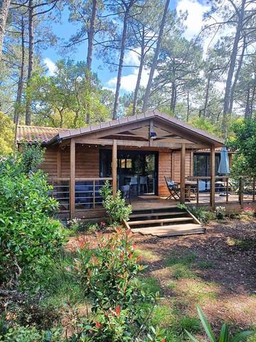 Parc de vacances pour 4 personnes, avec piscine et sauna ainsi que jardin et vue à Ondres