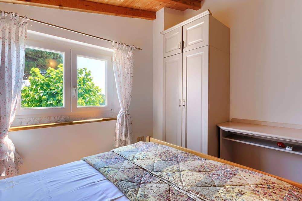 Schöne Wohnung in einem Ferienhaus mit W-Lan, Klimaanlage, Pool, Tv, Terrasse, Haustiere erlaubt in Kastelir, Općina Kaštelir - Labinci