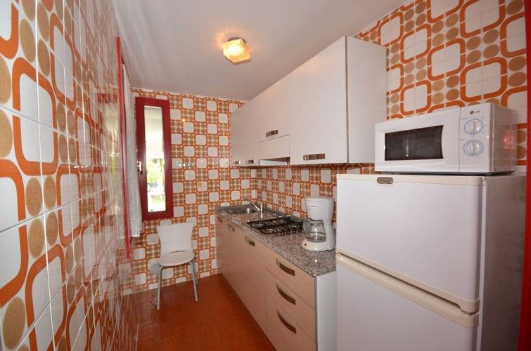 Maison de vacances pour 9 personnes avec balcon in Lignano Sabbiadoro, Province d'Udine