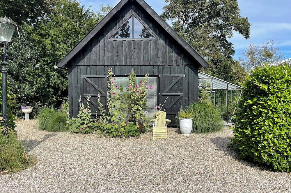De Woudlodge met grote orangerie en rondom natuur met geweldig uitzicht in Bergen (Noord-Holland), Noord-Holland - Kust van de Noordzee