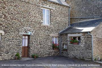 Cottage pour 2 personnes, avec jardin, animaux acceptés à Pont-d'Ouilly
