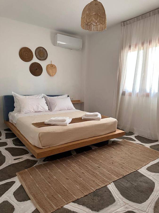 Ferienwohnung für 5 Personen, mit Terrasse und Garten sowie Ausblick in Vourvourou