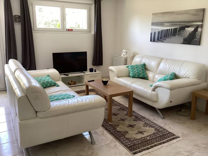 Appartement de vacances pour 4 personnes, avec jardin ainsi que piscine et terrasse